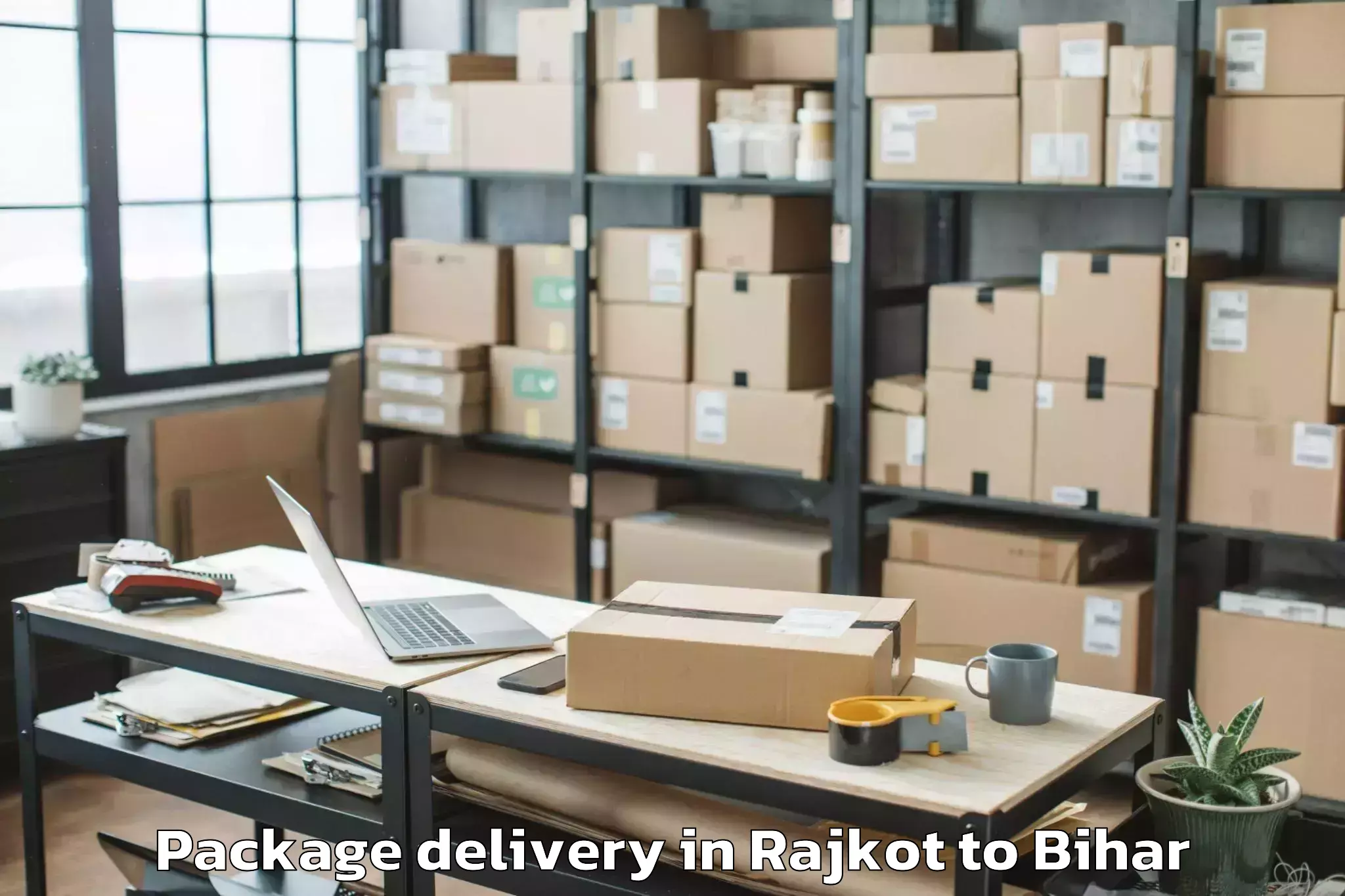 Quality Rajkot to Ghanshampur Package Delivery